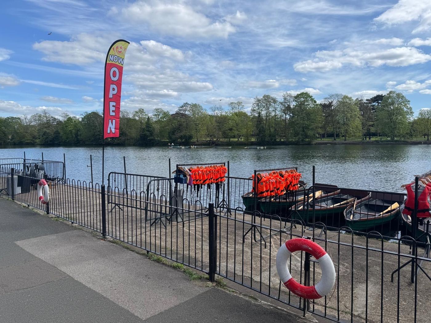 Now Open flag flying by the boat bay, with life jackets lined up ready to go