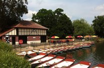 The boathouse with boats and umbrellas