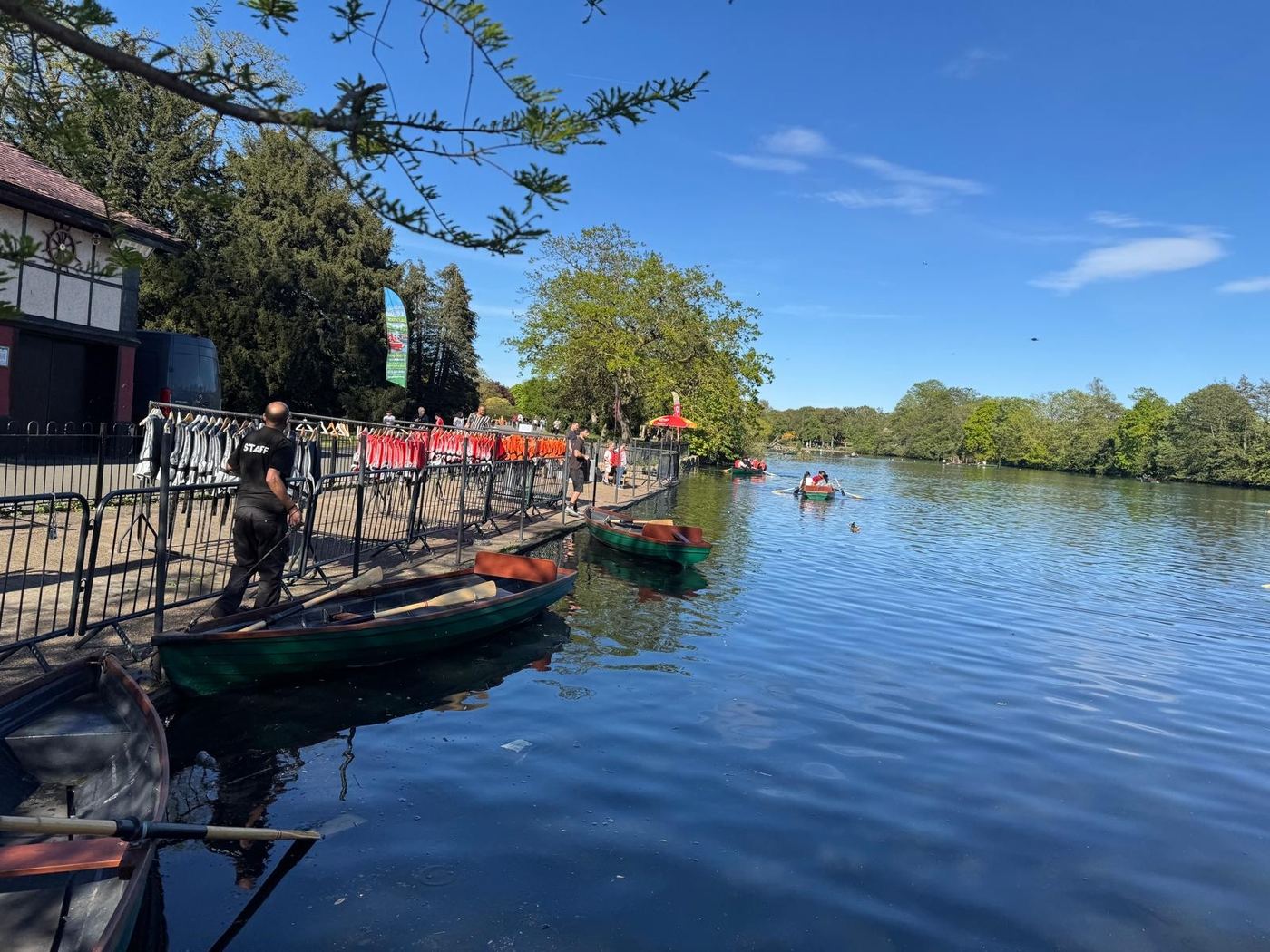 Rowing boats out on Valentines Lake on a sunny afternoon